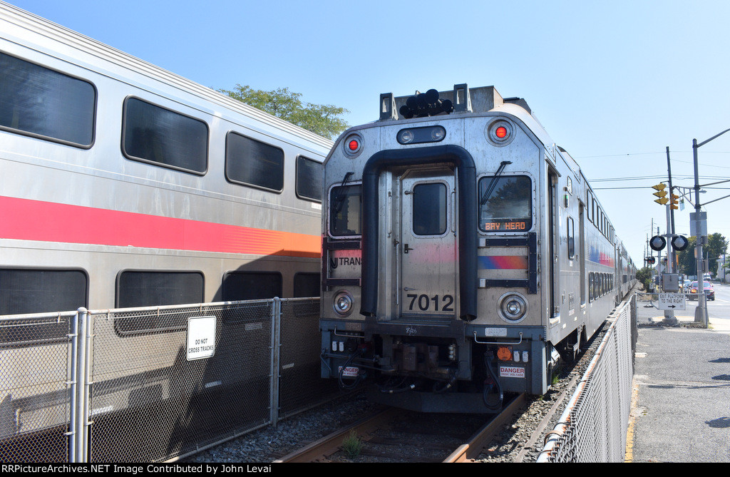 NJT Train # 4741 heads away from PPB Station on the right while NJT Train # 4744 pauses on the left